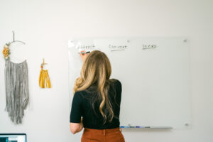 Image or Business Coach Laura Schoenfeld used for blog about how to get clients with a small audience